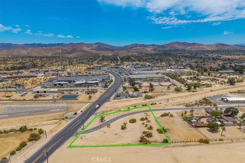 Photo of 6850 Old Woman Springs Road, Yucca Valley, CA 92284 (MLS # JT25144789)