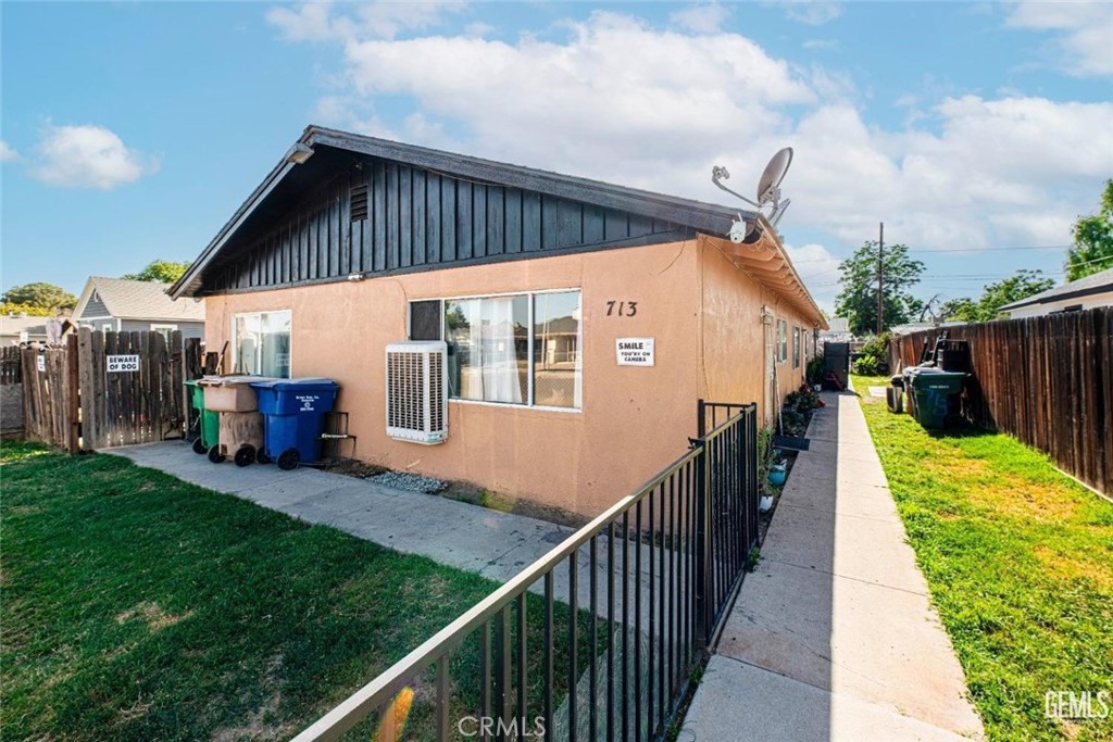 Each unit has 2 bedrooms and 1 bath plus central AC, a private yard and ample parking in the front and rear via alley access.