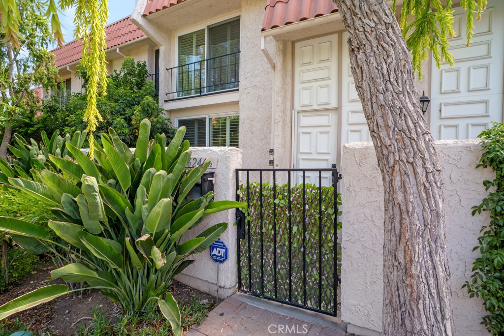 Stylish Poolfront Townhome with Dual Primary Suites! Step into elevated living with this beautifully updated 1,888 sq. ft. townhome, perfectly positioned poolside in one of the community’s most desirable interior locations. Blending luxury, comfort, and modern convenience, this residence offers two expansive primary suites, three bathrooms, and a direct-access two-car garage. At the heart of the home is a chef-inspired kitchen featuring granite countertops, a massive center island, and a full suite of appliances—including a top-of-the-line Viking range and separate full-size freezer—all framed by custom white cabinetry and sleek, modern finishes. Luxury flooring flows throughout the open-concept main level, which also includes a guest bathroom and seamless access to a private enclosed patio—perfect for relaxing or entertaining. Upstairs, both primary suites offer generous space and privacy. One suite overlooks the newly renovated resort-style pool and includes a large walk-in closet and adjacent bath. The main primary retreat boasts multiple closets, a spacious sitting area, and a stunning en-suite bathroom with a soaking tub, glass-enclosed shower, heated towel rack, and designer finishes.
With sophisticated upgrades throughout and just a few feet from the pool, this turnkey home is a rare opportunity for those seeking style, space, and serene comfort. Conveniently located near Warner Center restaurants, shopping, gym, nightlife and activities.
