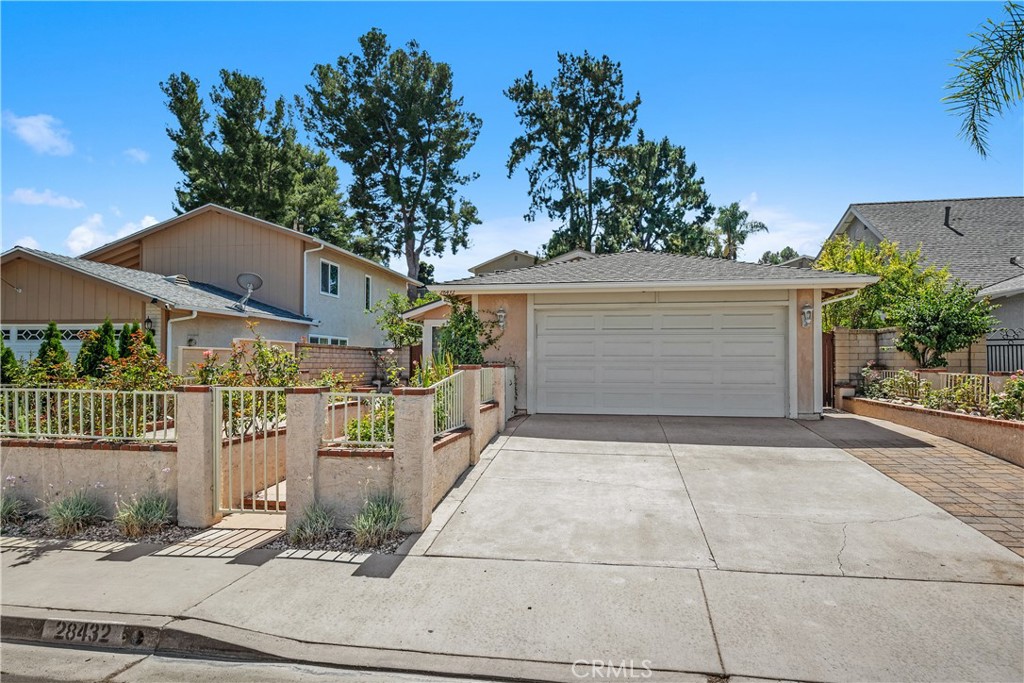 Welcome to this stunning single-story home nestled in one of the most desirable and well-established neighborhoods of Cordova Vista in Mission Viejo, Perfectly situated on a quiet cul-de-sac. This turnkey residence blends comfort, style, and functionality—making it an absolute dream for families and entertainers alike. From the moment you arrive, you’ll be captivated by the charming curb appeal, featuring a private front courtyard surrounded by a blooming rose garden that sets a welcoming tone. Step inside to discover a thoughtfully designed open floor plan with soaring ceilings, a cozy fireplace, and an abundance of natural light pouring in through dual-pane windows—creating a warm and inviting atmosphere throughout. The fully remodeled kitchen is a chef’s delight, featuring elegant travertine countertops, added cabinetry for extra storage, stainless-steel appliances and sink, and timeless neutral tones that complement any decor. Adjacent to the kitchen is a spacious dining area that seamlessly flows into an extended flex room perfect as a family room, playroom, home office, or media space. This well-appointed home offers four generously sized bedrooms, one of which is currently used as an office, all with attractive wood flooring. The updated bathrooms have been tastefully modernized with quality finishes, providing both style and function. Recessed lighting and designer touches throughout the home elevate its contemporary appeal. Additional features include: Home solar panels – enjoy energy efficiency and reduced utility costs, New HVAC/Heater system installed in 2020 – providing comfort year-round ;Two-car garage – with ample space for parking, storage, or a workshop Low HOA fees and NO Mello-Roos – offering excellent value. As a resident of this vibrant community, you’ll enjoy full membership to Lake Mission Viejo, where resort-style amenities await: swimming, boating, fishing, BBQ areas, scenic walking trails, boat rentals, two private beaches, summer concerts, and year-round events—perfect for enjoying the best of Southern California living. Whether you're looking to relax, entertain, or enjoy the outdoors, this home has it all. Don’t miss your opportunity to own a beautiful home in one of Mission Viejo’s most sought-after neighborhoods! Welcome home!