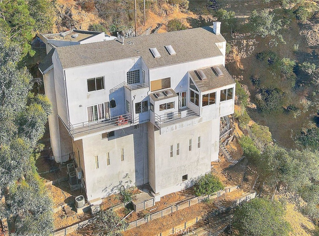 Location! Location! Location!
Excellent investment opportunity LOTS OF POTENTIAL! Perfect for owner user, builder, or investor. Located in one of the most desirable pockets of the famous Hollywood Hills, Mount Olympus!
This multi-level hillside home sits high between Laurel Canyon and Nichols Canyon, tucked away on a quiet, private end street with amazing canyon views and a peaceful setting. The home features a multi level floor plan, including basement, high ceilings with skylights. Views overlooking nature, canyons landscapes, local wildlife, sunsets, and even the stars at night' giving you the best of both worlds, the calm nature surroundings with close city access.
It’s a rare find where you can enjoy the peaceful beauty of canyon living while still being just minutes away from the Sunset Strip, major studios, and everything LA has to offer. Also located in a highly rated school district.
Don’t miss this one. Opportunities like this don’t come often!