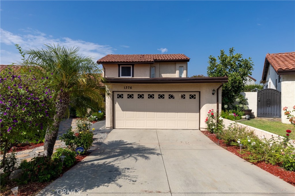 This beautiful home is perfectly situated in the heart of Upland. Located in a clean, quiet, and secure neighborhood, this home offers exceptional access to local parks, shopping centers, schools, and major freeways, making it ideal for both convenience and lifestyle.
As you step inside, you'll find a thoughtfully designed layout that blends comfort and function. The kitchen is a true highlight, featuring stunning granite countertops, abundant cabinet space, and a layout that opens directly to the dining room and offers access to the family room. The family room, complete with a cozy fireplace, provides a warm and inviting space for relaxation. Beautiful hardwood floors run throughout the main living area, adding a touch of timeless elegance.
The primary bedroom is conveniently located on the main floor and includes its own private bathroom. The laundry room and a guest half bath are also available downstairs. Upstairs, you'll find three additional bedrooms and a full bathroom with dual sink vanity and granite countertops, offering plenty of space and comfort for family or guests.
Outside, the home features a welcoming patio area in the front yard, and a patio in the backyard with plenty of room for children or pets to play. Whether you're looking to unwind in the peaceful surroundings or entertain in the outdoor space, this home provides the perfect setting.
Don’t miss the opportunity to make this charming Upland residence your next home. Contact us today to schedule a private tour!