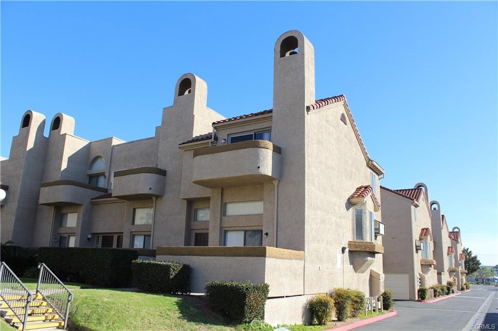 Totally remodeled! This charming 3-bedroom, 2.5-bathroom, 2-car garage end-unit townhome offering 1,460 sq ft of comfortable living space. Nestled in a quiet, well-maintained community, this home combines style, functionality, and convenience.
Step inside to a bright and airy living room with a cozy fireplace and vinyl flooring. The spacious kitchen features new white cabinets, quartz counter tops, stainless-steel appliances, and opens to the formal dining area, perfect for entertaining. Upstairs, you’ll find three generously sized bedrooms, including a primary suite with a private balcony and en-suite bath.
Enjoy California living with a private front patio and an additional upstairs balcony. Other highlights include an attached two-car garage with direct access, inside laundry, and plenty of storage. Property is recently remodeled with new interior paint, new vinyl flooring, new bathrooms, new kitchen.
The community offers lush landscaping and a peaceful courtyard setting. Conveniently located near shopping, dining, Walking distance to Bon View Elementary, and major freeways – and just minutes from Ontario International Airport. Low Property Tax!