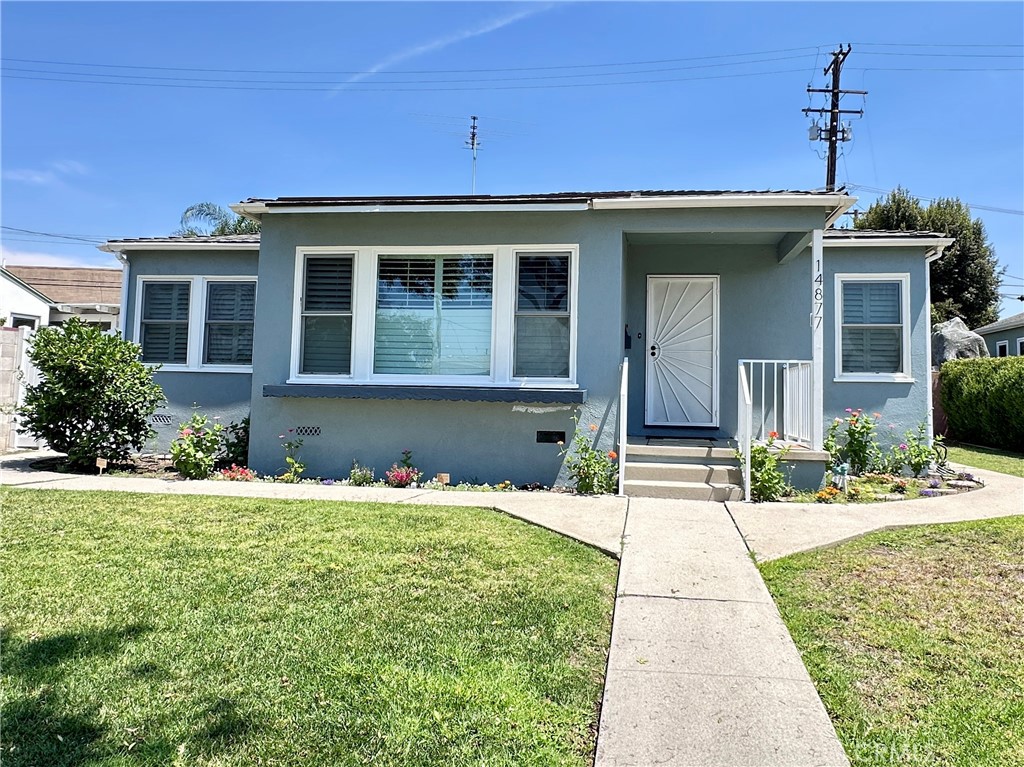 Great opportunity! This cozy home has been remodeled from top to bottom, but still maintains its vintage feel. The open living space boasts crown molding, recessed lighting, dual paned windows, plantation shutters and beautiful newly refinished wood floors. The kitchen features new cabinets with soft close drawers, quartz countertops, and new appliances. A laundry room with included washer & dryer also has the utility of offering a shop sink. The bathroom has a new vanity and tub/shower with porcelain tile surround and an inset shelf. This home not only looks great, but it has great "bones"...central air conditioning, attic furnace, 40 gallon water heater, and a water softener service that will be provided monthly by the landlord. The curb appeal will be maintained by gardeners and kept green by an automatic sprinkler and drip system in the front yard. The surrounding streets of Whittier have an abundance of shopping and restaurants, nearby medical care and recreational facilities. Make lemonade with your own home grown Meyer lemons or walk out your back gate to Starbucks, this home has a lot to offer.