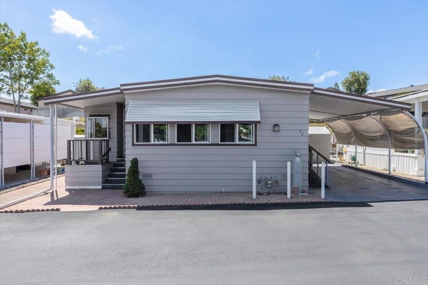 Own your own land & Home!  55+ Resident-Owned Community!  Welcome to Corona Del Vista, a well-maintained, resident-owned co-op share 55+ community where you own your land—no space rent or monthly land lease, and No Buyer in Fee! This home boasts a spacious yard with fruit trees and two storage sheds.  Home is conveniently located nearby to guest parking, pool, clubhouse and other amenities!  Wheelchair ramp provides easier access to all guests!  Home has been upgraded with dual pane windows, and a newer Central A/C and water heater.  Two solar tubes provide natural light inside.  Corona Del Vista allows one pet under 40 lbs per household.  The second resident can be age 45+.  Low HOA fee of only $222/mo includes Trash & Dish Network Cable TV.  Amenities include a clubhouse, pool, spa, library, shuffle board, BBQs, fenced dog park, RV parking (for an additional fee and per availability), and so much more!  Located near shopping, restaurants, public transportation and just a short drive to the beach!