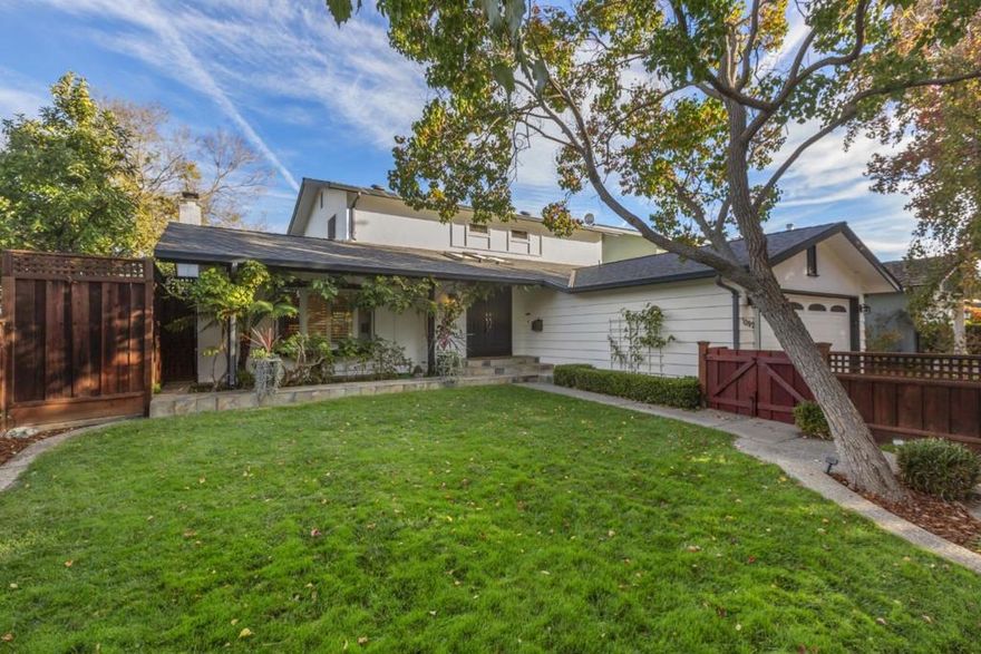 Perfectly located in a quiet West San Jose neighborhood, this beautifully updated 4BR/3BA home offers 1,880 sq. ft. of living space and an ideal blend of comfort and convenience. A ground level bedroom is perfect for guests or multi-generational living. A backyard gate opens directly to Easterbrook Elementary's outdoor spaces, walking trails, & exercise track providing a scenic & easy walk to school. Open floor plan connects the living, dining, & kitchen areas, ideal for entertaining or everyday living. The sophisticated chefs kitchen boasts newer appliances, a large island with prep sink & second dishwasher drawer, gas cooktop with stove hood, built-in oven, full-size dishwasher, walk-in pantry. The luxurious primary suite features a private balcony, two closets (one walk-in), & a remodeled bath. Enjoy anytime of year in the lush backyard with faux grass, a deck, covered porch, and abundance of fruit trees: avocado, orange, lemon, mandarin, yuzu, apple, and grapevines. Additional updates include remodeled baths, newer roof & exterior paint, upgraded sewer line, insulation, refinished hardwood floors, solar tube, & newer LG washer/dryer & water heater. Quick access to Westgate, Paseo Saratoga, upcoming Costco, library, dog park, and Hwys 280 & 85. Live the Silicon Valley Dream!