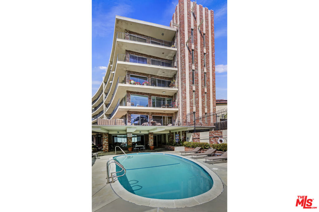 Welcome to your private retreat in the highly sought-after Hollywood Dell neighborhood of The Hollywood Hills! Located in a mid-century building, this beautifully designed 1-bedroom, 1-bathroom condo at 2260 N Cahuenga Blvd offers 853 square feet of modern living space in an unbeatable location, just moments from the legendary Hollywood Bowl and vibrant city life. Step inside to find a bright, open-concept living area with large windows that bathe the space in natural light. Both the living room and spacious bedroom offer direct access to the private balcony, creating a seamless indoor-outdoor flow perfect for relaxation. The sleek bathroom adds a touch of elegance to this thoughtfully designed home. A standout feature is the converted closet off the living room, which has been set up as a recording booth, complete with Switchcraft wall plates for easy cable connections. This is an ideal space for musicians, voice-over artists, or content creators. Additional perks include assigned parking, guest parking, a secured garage, an intercom system, and an elevator for easy access. Laundry facilities are also available in the building for added convenience. Don't miss this rare opportunity to lease a stylish, amenity-rich condo in one of LA's most desirable neighborhoods.