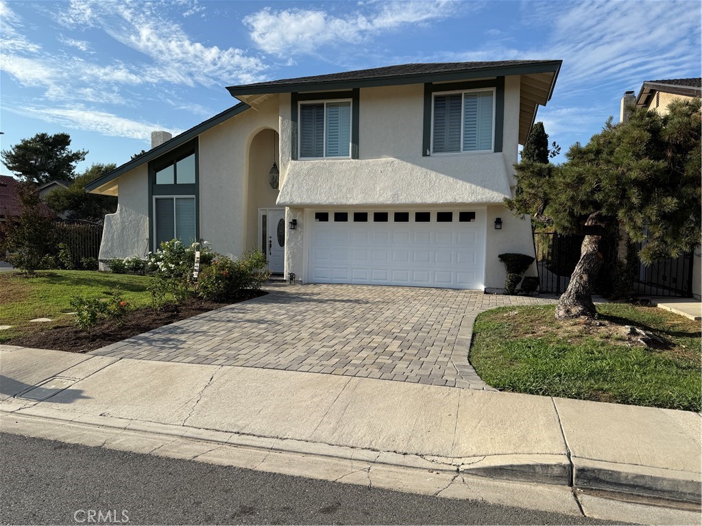 Beautiful home, after a long face lift, all new paint, Inside & Out, total Refurbished Spa, all new carpet, the master bedroom has Two closets for
Wife & Husband! Driveway now has been tiled, yard has new sod in some spots, & patio now has some more Sun protection overhead! The lot is an Inside Corner Location, & and only 3 blocks from South Coast Plaza, & the Performing Arts Theater (6 blocks)! Very nice home for entertaining !!