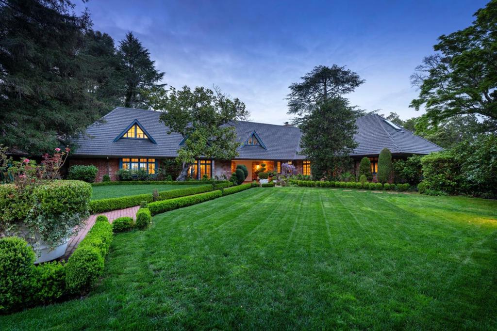 Tucked at the end of a quiet cul-de-sac on approximately 2 private acres, The Koshland Estate is a once-in-a-lifetime offering in one of the Peninsulas most prestigious enclaves. Designed in 1961 by Frank Lloyd Wright disciple Howard Friedman for his father-in-law, Levi Strauss & Co. President and CEO Daniel Koshland, the home was constructed to exceptional commercial-grade standards, rarely seen in residential design. This approx. 8,000 square foot home offers 6 bedrooms, 4 full baths, and 2 half baths, all thoughtfully arranged within a layout that blends timeless design with grand-scale living. Positioned on a broad, level lot, the estate captures sweeping 200° views from San Francisco to San Jose, showcasing city skylines, iconic bridges, and the full expanse of the Bay Area. The Koshland Estate delivers an extraordinary combination of privacy, accessibility, and world-class vistas. A true Peninsula icon.