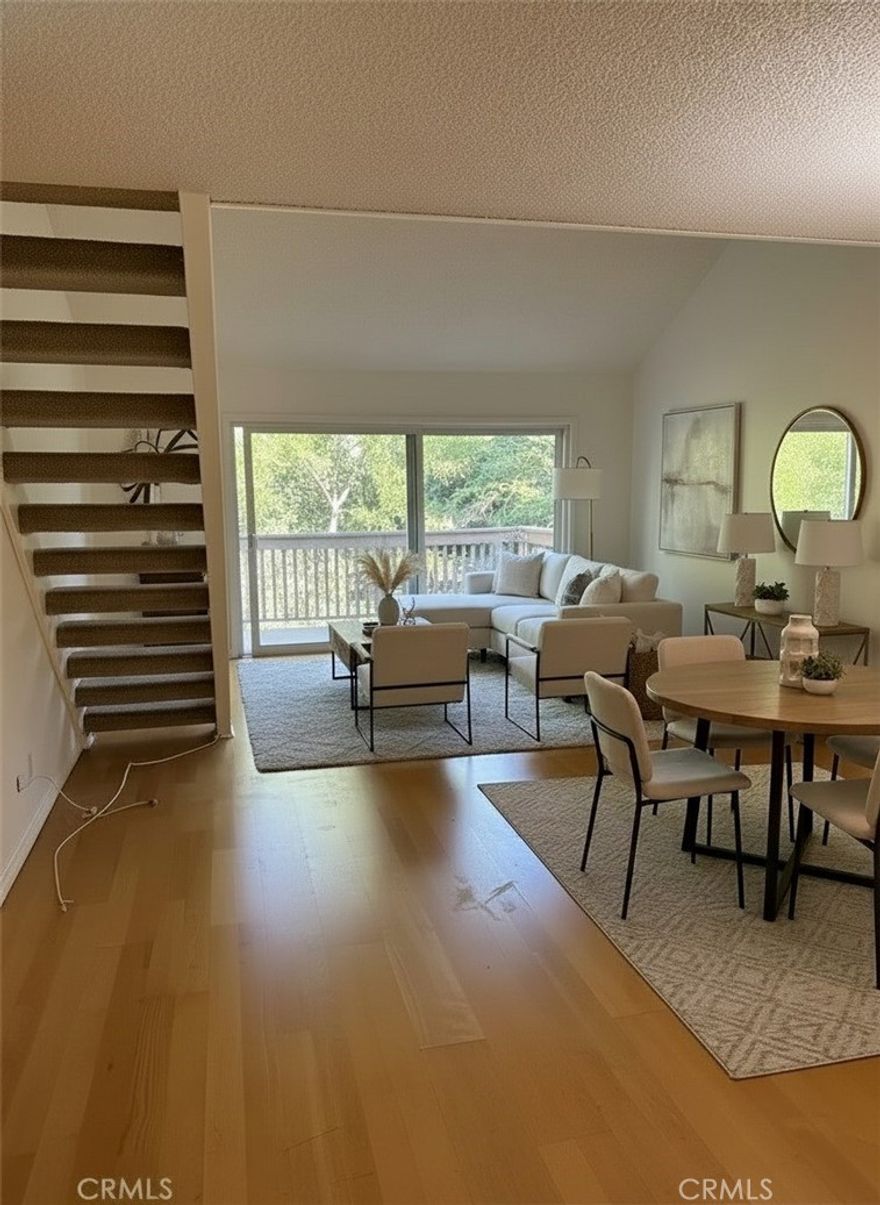 Charming 2-bedroom condo with loft in a prime location, featuring an upgraded kitchen, renovated bathroom, and plenty of cabinets and storage. This unit comes with two parking spots, numbers 210 and 191, and has been freshly painted with new carpet in the bedrooms and loft. It offers a dedicated laundry area, central air, and heating. A spacious balcony provides the perfect spot to relax and enjoy the serene surroundings filled with ducks, koi fish, and turtles. HOA perks include sparkling pools, Jacuzzis, Saunas, lighted tennis courts, and a fitness room. Canoga Lakes is a peaceful retreat close to transportation, hospitals, fine dining, bike trails, hiking, the Village, Topanga Westfield Mall, Fallbrook Mall, Malibu Wines, and entertainment. You are going to love living in Canoga Lakes!