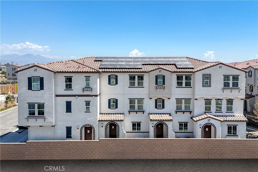 NEW CONSTRUCTION MOVE-IN FOR THE HOLIDAYS! This stylish 3-story end-unit townhouse offers modern finishes and comfortable family living. The spacious, inviting ground-level entry includes a convenient coat closet.

The second floor features an open-concept layout with a contemporary kitchen complete with a center island, sink, dishwasher, and bar seating, all opening to the great room—perfect for entertaining and family gatherings. A powder room with modern finishes adds convenience for guests.

Upstairs on the third floor, you'll find a secondary bedroom with a full bathroom, a side-by-side laundry closet, and a private primary suite enhanced by built-in cabinetry and a modern, spa-like ensuite bath with linen storage.

Located within a beautifully appointed gated community featuring desirable neighborhood amenities including a sparkling pool and clubhouse. Enjoy modern comfort, convenience, and turnkey living!  PROFESSIONAL PICTURES HAVE BEEN VIRTUALLY STAGED