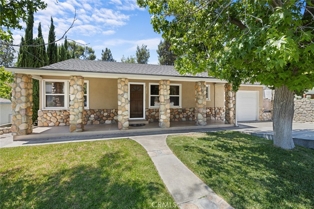 Located in a highly sought-after La Crescenta neighborhood, just around the corner from award-winning Valley View Elementary School, this charming home offers comfort, potential, and an unbeatable location. Featuring two carports and a two-car garage, the layout provides flexible parking options—one of the carports is attached and functions more like a traditional garage.
The home showcases beautiful river rock accents in the front and opens up to a spacious, private backyard perfect for unwinding. An oversized pergola offers a serene setting ideal for outdoor dining, entertaining, or simply relaxing after a long day.
Inside, you'll find two well-sized bedrooms and one full bathroom. A newer roof adds value and peace of mind. The detached garage presents exciting potential for an ADU (Accessory Dwelling Unit), offering added versatility and investment opportunity.
With just a few personal touches, this home could easily become your dream retreat in the foothills of La Crescenta.