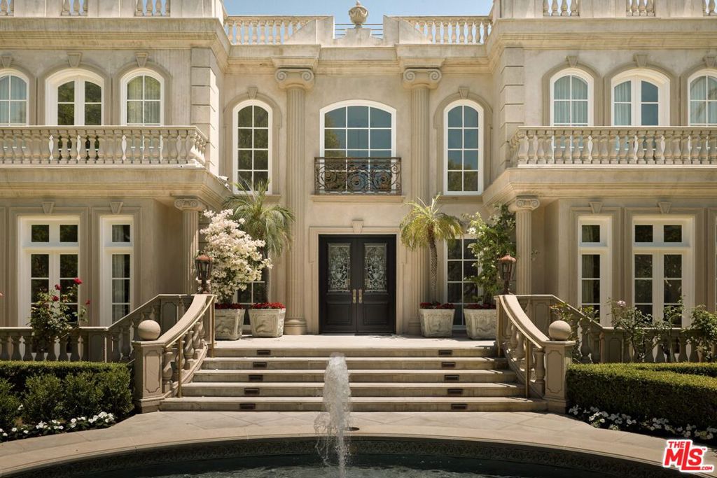 Unlock an exceptional leasing opportunity: a grand 8-bedroom estate on the most coveted street in Beverly Hills Flats, minutes from the Golden Triangle's top retail and dining. Reimagined with Harrison Design, it features soaring scale, precision millwork, and timeless architectural detail. Behind custom gates lie expansive living areas, lush grounds, and a 2,000 sqft basement with a grand ballroom and full-service preparation room ideal for entertaining. Highlights include a 6-car garage, private driveway, and secondary guest entrance. Enjoy rare privacy and prestige rivaling Beverly Park while benefiting from the Flats' prime location. Fully restored with modern systems and manicured exteriors, this turnkey home offers more than a lease, it's a strategic lifestyle move.
