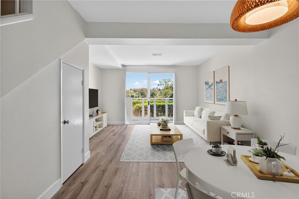 Welcome to La Vista in Laguna Niguel, where resort-style living meets everyday comfort. This beautifully upgraded 2-bedroom, 2.5-bath townhome offers panoramic views of the El Niguel Golf Course and an ideal coastal location just minutes from the beach.
Step inside to find brand new luxury vinyl flooring and a bright, open floor plan that seamlessly connects the living, dining, and kitchen areas. The inviting living room features large windows framing sweeping golf course views, while the adjacent dining area opens to a private patio—perfect for relaxing or entertaining.
Both upstairs bedrooms are true ensuites, offering privacy and convenience. The primary suite enjoys tranquil golf course vistas, vaulted ceilings, and a spacious bath. The secondary suite is equally generous, ideal for guests or a home office. A stylish guest powder bath is located on the main level.
La Vista offers residents resort-like amenities including a sparkling pool, spa, clubhouse, and fitness center. Nestled in a prime Laguna Niguel location, you’re just minutes to Salt Creek Beach, Dana Point Harbor, world-class resorts, hiking trails, and shopping/dining at Laguna Beach and Monarch Beach. Easy access to the 5 and 73 freeways adds to the home’s convenience.
Whether as a primary residence or coastal getaway, this property is a rare opportunity to experience the best of Orange County living with unmatched golf course views.