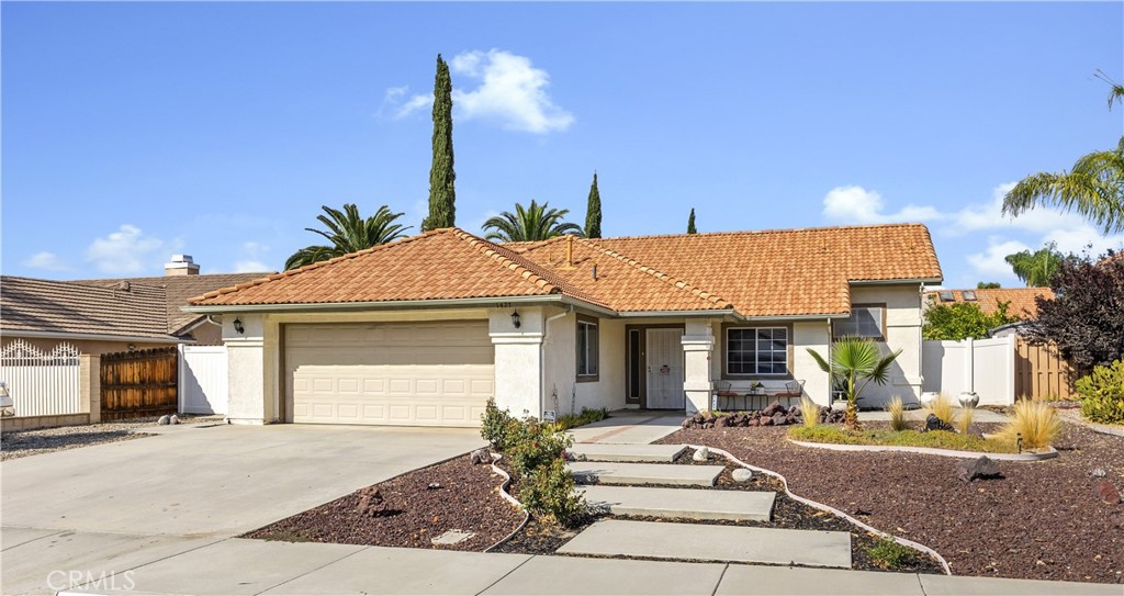 Welcome home to 1427 E. Beringer Drive. Located in San Jacinto's Park Hill community. The interior of this gorgeous 3 bedroom/2-bathroom home boasts a clean and inviting ambiance with newer carpet, paint, and water heater. Beautiful, vaulted ceilings in living room and kitchen. Main bedroom has vaulted ceilings and is very spacious with a walk-in closet and an ensuite bathroom. The backyard is a hidden oasis that is a welcoming place for relaxation and entertainment. Possible RV access on side of home. Walking distance to nearby parks and conveniently located close to schools, shopping centers, and restaurants. Offering a rare combination of modern elegance, practical convenience, and everyday comfort. Low tax area too!