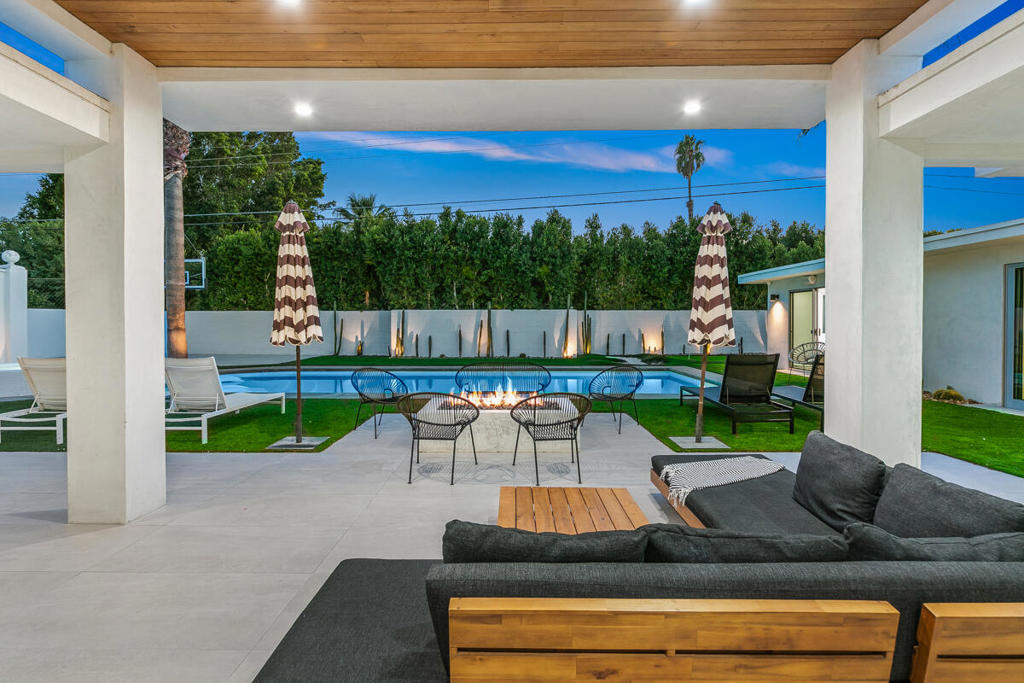 Welcome to your dream getaway in Palm Desert! This stunning contemporary modern pool home is available for flexible month-to-month leasing and offers the perfect blend of luxury, space, and entertainment. With 4 spacious bedrooms, 4 full bathrooms, and accommodations for up to 11 guests, this is the ideal desert escape for families, groups, or corporate retreats.Step inside to an open, light-filled floorplan featuring modern finishes and a bonus room complete with a full bar and stylish sitting area--perfect for entertaining or relaxing in style. Outside, the resort-style backyard is a true showstopper, boasting a massive covered patio with wood-planked ceiling, fully equipped outdoor kitchen, and a sparkling pool and spa with a generous tanning shelf for lounging under the sun.The fun continues with a basketball court, putting green, ping pong table, and pool table--everything you need for hours of enjoyment. Whether you're hosting a BBQ, soaking in the spa, or enjoying cocktails at sunset, this home has it all.Conveniently located in the heart of Palm Desert, close to world-class golf, shopping, dining, and festivals.One month minimum, prices vary per month as follows:January $12,000February $17,000March $17,000April $18,000May $13,000June $7,900July $7,900August $7,900September $7,900October $14,000November $17,000December $17,000
