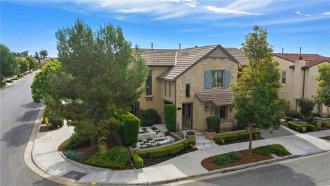 Photo of 108 Grassblade, Irvine, CA 92618 (MLS # OC26034405)