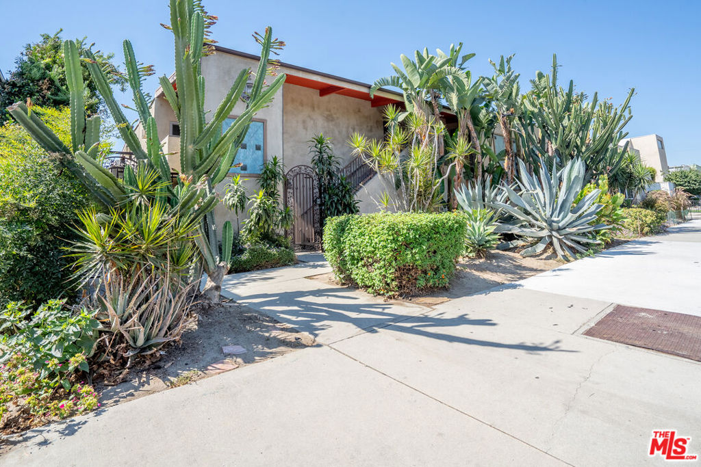 REMODELED UPPER UNIT WITH TERRACE: A lovely 2 bedroom, 2 bath residence in the heart of desirable Valley Village. From the moment you arrive, the adobe-inspired exterior and lush succulent landscaping set a welcoming tone. Inside, you'll find a beautifully remodeled home featuring a standout farmhouse-style kitchen with stainless steel appliances, center island, and in-unit washer/dryer. The spacious living room showcases warm woodwork and striking exposed beams, a rare and elevated touch not often found in condominium rentals. Valley Village itself offers a wonderful blend of serenity and convenience, with tree-lined streets, a strong community feel, and easy access to major studios, the NoHo Arts District, Ventura Boulevard dining, and freeways. This special home is available for immediate move-in and includes 2 parking (tandem spot). Owner pays monthly HOA dues that include trash and gardener. Renters insurance is required, a small pet may be considered, and strong applications with excellent credit and references are a must. No smoking or vaping allowed. Opportunities like this in Valley Village don't last long. Make your appointment today.