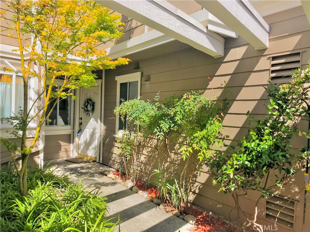 Located in highly sought-after Laguna Beach in The Terraces, with 2 en-suite primary bedrooms PLUS 2 1-car garages for a total of 3 parking spaces, and it's situated at the end of the cul-de-sac. Refrigerator & private laundry, washer/dryer included! High ceilings, skylights, recessed lighting, back patio and spacious kitchen plus a fireplace. Unit has been refreshed & updated inside & out with paint, new flooring, updated primary bathroom, kitchen sink & more. All this, plus the Laguna Beach school system! This community has 2 pools, bbq area and more. Conveniently located near the 73, hiking trails & more.
