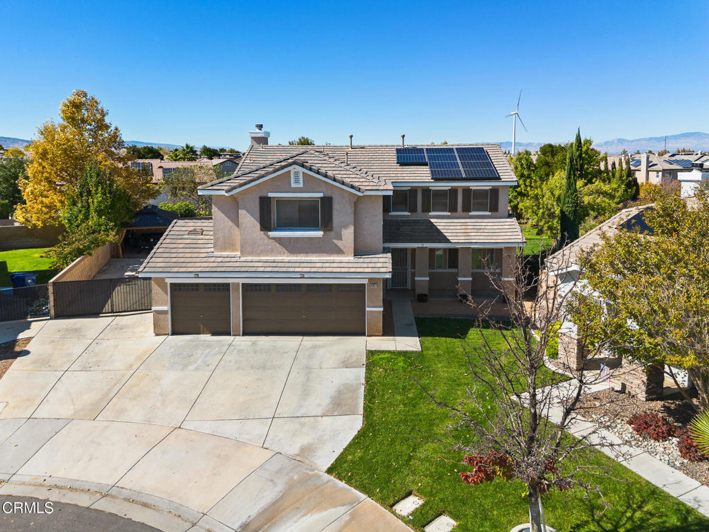 Beautiful 6-bed, 3-bath traditional-style home on a quiet West Lancaster cul-de-sac! Built in 2003 and exceptionally maintained, this 2,818 sq ft residence sits on a large 11,000+ sq ft lot and offers a perfect balance of comfort and function. Features include freshly painted interiors, a mix of laminate and professionally cleaned carpet flooring, and a welcoming layout. The open kitchen showcases granite countertops, a walk-in pantry, and connects to the family room with a cozy fireplace--ideal for gatherings. A formal living and dining area provide extra entertaining space. Downstairs includes one bedroom next to a full bathroom and an indoor laundry room for added convenience.Upstairs, the spacious primary suite offers dual sinks, a soaking tub, separate shower, and walk-in closet. Four additional bedrooms and a large loft complete the upper level, providing flexibility for a home office, gym, or media space.The backyard is a true highlight--professionally improved with new concrete, added grass, and its own irrigation sprinkler system. Enjoy a full-length covered patio and a beautiful permanent gazebo that stays with the sale, perfect for outdoor dining, entertaining, or relaxing in the evenings. The exterior fascia has been freshly painted, and the property offers gated RV parking and a 3-car garage. The expansive lot provides room for a pool, garden, or future ADU (buyer to verify).Leased solar helps reduce energy costs. No HOA. Conveniently located near schools, shopping, and the 14 Freeway. Zoned for Endeavour Middle and Lancaster High.This move-in ready West Lancaster gem combines space, updates, and outdoor living--plus a stunning backyard gazebo included with the sale. Schedule your private tour today!