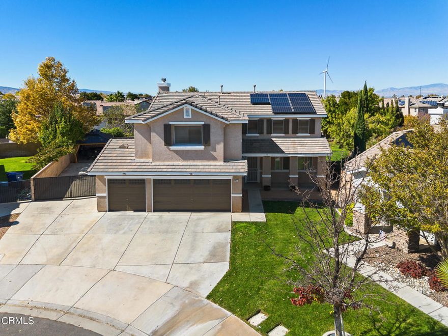 Beautiful 6-bed, 3-bath traditional-style home on a quiet West Lancaster cul-de-sac! Built in 2003 and exceptionally maintained, this 2,818 sq ft residence sits on a large 11,000+ sq ft lot and offers a perfect balance of comfort and function. Features include freshly painted interiors, a mix of laminate and professionally cleaned carpet flooring, and a welcoming layout. The open kitchen showcases granite countertops, a walk-in pantry, and connects to the family room with a cozy fireplace--ideal for gatherings. A formal living and dining area provide extra entertaining space. Downstairs includes one bedroom next to a full bathroom and an indoor laundry room for added convenience.Upstairs, the spacious primary suite offers dual sinks, a soaking tub, separate shower, and walk-in closet. Four additional bedrooms and a large loft complete the upper level, providing flexibility for a home office, gym, or media space.The backyard is a true highlight--professionally improved with new concrete, added grass, and its own irrigation sprinkler system. Enjoy a full-length covered patio and a beautiful permanent gazebo that stays with the sale, perfect for outdoor dining, entertaining, or relaxing in the evenings. The exterior fascia has been freshly painted, and the property offers gated RV parking and a 3-car garage. The expansive lot provides room for a pool, garden, or future ADU (buyer to verify).Leased solar helps reduce energy costs. No HOA. Conveniently located near schools, shopping, and the 14 Freeway. Zoned for Endeavour Middle and Lancaster High.This move-in ready West Lancaster gem combines space, updates, and outdoor living--plus a stunning backyard gazebo included with the sale. Schedule your private tour today!