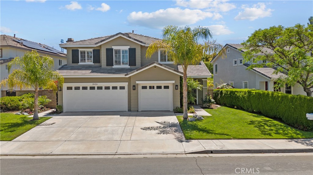 Now listed at a new lower price, this 4-bedroom, 2.5-bath Valencia home offers 2,350 sq ft of space, function, and modern upgrades. The kitchen features granite countertops and ample cabinet storage. Flooring includes travertine downstairs and engineered wood upstairs. Bathrooms are updated with modern tile finishes. Backyard is perfect for entertaining with a built-in BBQ. Leased solar system powers the home and can support up to two EVs. 3-car garage and resort-style HOA amenities included.