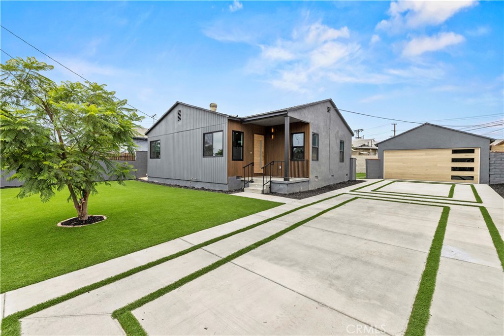 A showcase of modern elegance and thoughtful design, this fully remodeled 3-bedroom, 2-bath home offers luxurious living in a prime neighborhood near Burbank Airport, Fair Avenue Elementary, and a variety of shops and dining.
From the moment you arrive, the home's curb appeal captivates with custom siding, a striking white oak garage door on the detached garage, and a beautifully crafted paved turf driveway surrounded by lush, newly designed landscaping.
Step inside to an airy open floor plan highlighted by a stunning white oak kitchen featuring a sleek peninsula, built-in microwave, and all-new premium appliances — perfect for stylish entertaining and everyday living. Elegant finishes continue throughout, with brand new flooring, dual-pane windows, electrical, and plumbing upgrades throughout the home.
Both bathrooms have been meticulously designed with floating vanities, curated tilework, and glass shower enclosures, offering a spa-like retreat.
Blending sophisticated upgrades with warm, welcoming touches, this home is the perfect fusion of beauty and convenience — a true gem in the heart of the Valley.