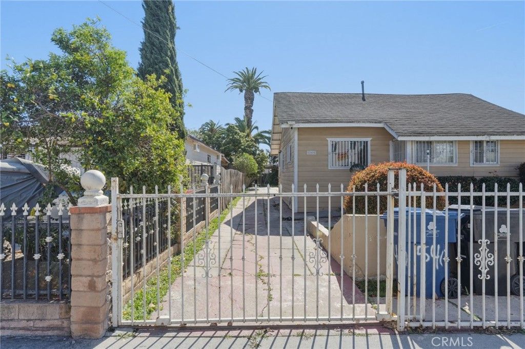 Photo of 540 W 93rd St, Los Angeles, CA 90044 (MLS # PW26037313)