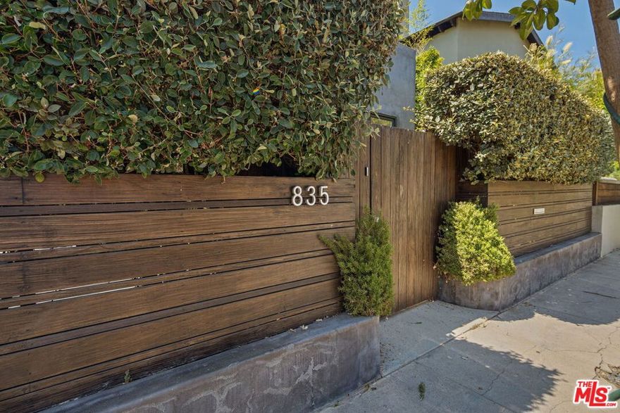 This beautifully updated 4 bed / 3 bath home is now available for lease, offering a blend of sophistication and comfort. Mature landscaping creates privacy, while sunlight fills the open layout. The main level features custom reclaimed woodwork, brass kitchen accents, hardwood floors, and a welcoming fireplace. The family room opens fully to the outdoors through accordion glass doors an ideal entertaining space that also converts into a private screening room with blackout shades, projector, and surround sound. Upstairs, the primary suite includes a spacious balcony/rooftop deck with palm tree views  perfect for morning coffee or catching the ocean air. Two additional bedrooms are generously sized and share a full hall bath. With thoughtful upgrades, inviting living spaces, and a location close to the beach and neighborhood favorites, this home offers an exceptional coastal lifestyle.