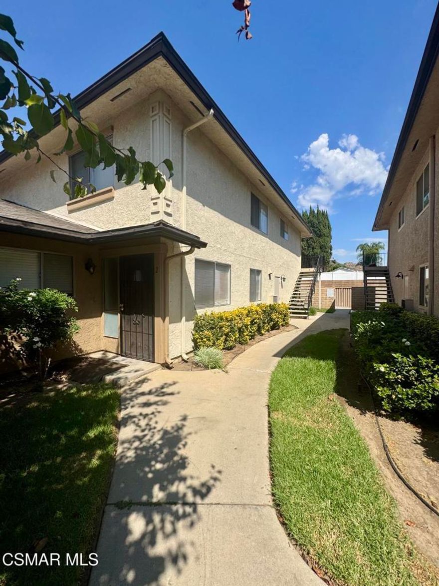Updated 2 bedroom condo with wood-like floors & central a/c. The kitchen has granite counters, dishwasher and includes a refrigerator. The bathroom has been updated with newer vanity, mirror, and lighting. Single car shared garage & assigned parking space. Community pool and shared laundry facility. Water and trash are included. Centrally located near shopping & parks.