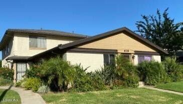 Updated 2 bedroom condo with wood-like floors & central a/c. The kitchen has granite counters, dishwasher and includes a refrigerator. The bathroom has been updated with newer vanity, mirror, and lighting. Single car shared garage & assigned parking space. Community pool and shared laundry facility. Water and trash are included. Centrally located near shopping & parks.