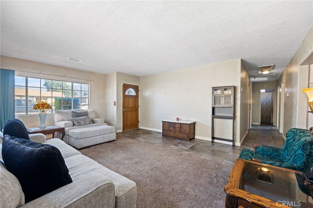 Photo of 4861 San Bernardino St, Montclair, CA 91763 (MLS # PW25245430)