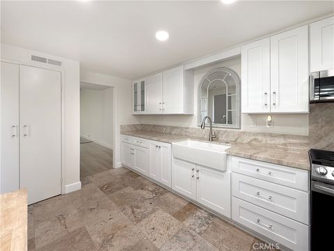 Photo of 1232 Woodside Drive, Placentia, CA 92870 (MLS # PW26043836)