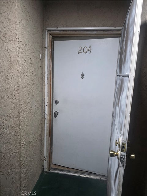 Photo of 1741 Neil Armstrong Street #204, Montebello, CA 90640 (MLS # DW26226711)