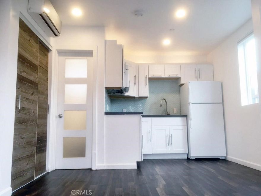 Charming 1+1 ADU located in the heart of Simi Valley. This cozy 500-square-foot unit features a well-appointed living area with ample space, and a modern kitchenette. Newer features include wood flooring, a washer and dryer, a full bathroom, and a beautifully updated kitchen. Enjoy the convenience of private patio access and your own private entrance—perfect for anyone seeking comfort, privacy, and ease in a peaceful neighborhood.” All utilities included as well and close to all banking, shopping, restaurants and award winning schools