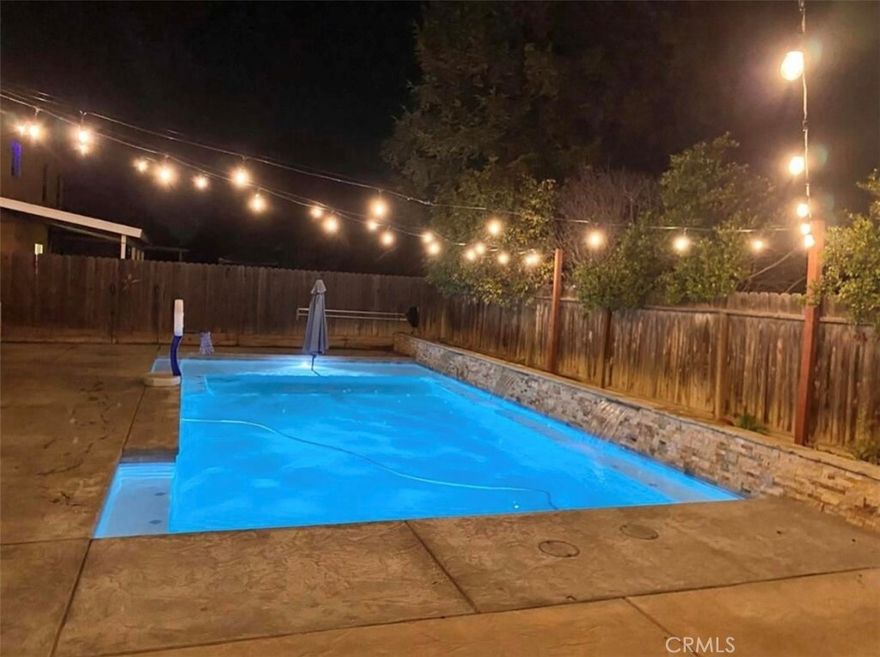 Turnkey furnished investment property generating $5,650/month in rental income. This spacious 6-bedroom, 4-bathroom home features nearly 3,000 sq ft of living space, including two primary suites with en-suite baths, making it ideal for multi-generational living, co-living, or premium rental strategies. Interior upgrades include laminate wood flooring, barn doors, and a luxury wet room with triple shower heads. The open-concept kitchen flows into a large living area, perfect for shared occupancy. Enjoy a private backyard with pool, covered patio, and relatively new fencing—excellent for tenant retention and lifestyle appeal. A leased solar system helps reduce utility costs. Home is sold furnished, offering immediate income with minimal setup. On a corner lot with ample parking. No HOA. Conveniently located near shopping, dining, and commuter routes.