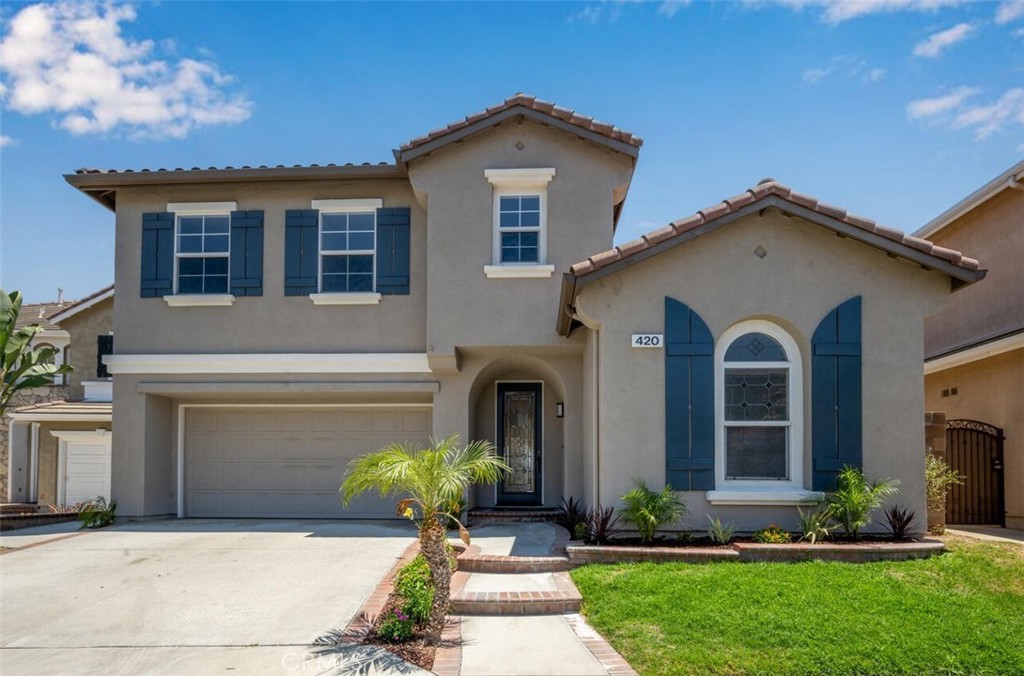 Step into this beautifully renovated five-bedroom, two-bathroom home, nestled in the desirable Alta Vista Community, where modern upgrades meet expansive living space. The open-concept floor plan is flooded with natural light, creating a warm and inviting atmosphere throughout. Enjoy the brand-new carpeting, a spacious gourmet kitchen featuring ample cabinetry, a large island, sleek countertops, and high-end stainless steel appliances. The home is equipped with energy-efficient dual-pane windows for added comfort. This layout also includes a private downstairs bedroom and bathroom, ideal for guests or as a peaceful retreat. The primary suite boasts two generous walk-in closets and a recently updated bathroom complete with Travertine floors, a double vanity, a roomy shower, and a large soaking tub. The three-car garage offers plenty of built-in storage cabinets, and the laundry room adds to the home's functionality. Outside, the large, private backyard offers the perfect space for relaxation or entertaining, with no rear neighbors ensuring privacy and scenic mountain views. Plus, it’s just a short stroll to the clubhouse and pool/spa area. Don't miss your chance to make this extraordinary home yours!