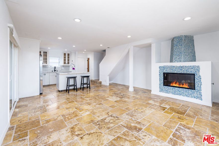 This beautifully appointed Zumirez View front row end unit has a spacious, open floor plan, lots of light, a peaceful patio and bonus side yard. Quality materials throughout, including stainless appliances, butcher block counter tops, custom rolling kitchen island and travertine and bamboo flooring. Bathrooms feature contemporary fixtures, and a large soaking tub. Master bedroom has a little a balcony with a peek a boo ocean view- Bonus room above garage perfect for office or extra storage!