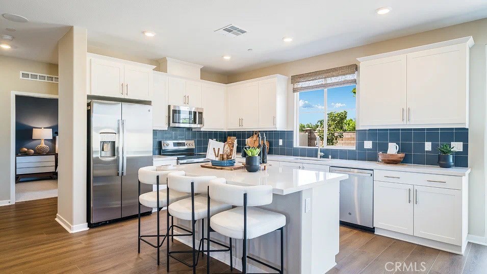 NEW CONSTRUCTION! This new two-story home is ready for modern lifestyles. On the first floor, the kitchen, living and dining areas share an inviting open-concept layout, with a secluded bedroom tucked away at the back of the home. On the second floor, a versatile study provides a convenient shared living space easily accessible from two bedroom and a luxurious owner’s suite, complete with a full bathroom and dual walk-in closets.
Armonia is a new series offering brand-new single family homes for sale now selling in the Legado masterplan in Menifee, CA. The community offers an amenity-rich lifestyle with access to a modern clubhouse, sport courts, multiuse trails and much more. Nature lovers will enjoy ample outdoor recreation on nearby Lake Menifee and at Menifee Lakes Park or Paloma Valley Park. The Promenade at Menifee Valley is a local shopping center with an array of shopping, dining and entertainment options.