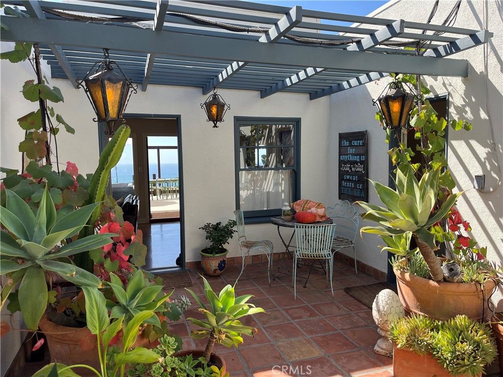 Photo of 845 Temple Hills Dr, Laguna Beach, CA 92651 (MLS # LG25246605)