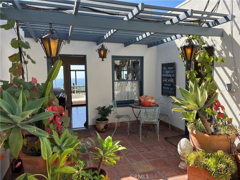 Photo of 845 Temple Hills Dr, Laguna Beach, CA 92651 (MLS # LG25246605)