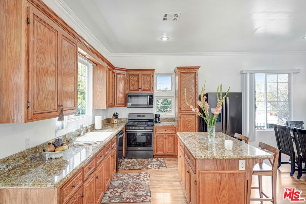 Photo of 829 N Avenue 53 Ave, Los Angeles, CA 90042 (MLS # 26654129)