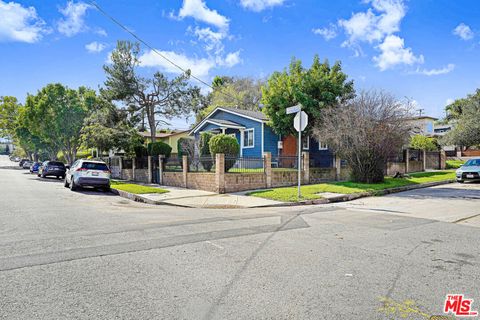 Photo of 829 N Avenue 53 Ave, Los Angeles, CA 90042 (MLS # 26654129)