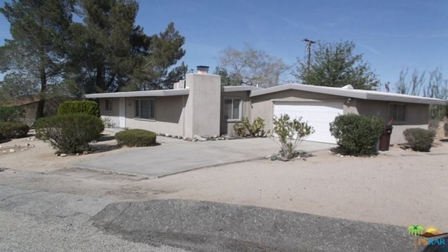 REDUCED!! Up high in Indian Cove, this home has it all! Close to the mountains, on a double corner lot, with nothing across the street to block the beautiful unobstructed views. Home has been freshly painted, and is in pristine condition. Enclosed permitted sunroom looks out on a garden back yard with saguaro, ocotillo and other desertscape landscaping that is both pleasant to look at and needs minimal upkeep and water. Both back and front have gorgeous views. Family room is large with decorative rock fireplace and efficient heatilator. Home has both AC and swamp, AC is less than 5 yrs old, hot water heater is new. Security doors on both back and front doors. Home warranty is being included in this sale also! In a great location, great condition, and priced to sell, this won't last long.