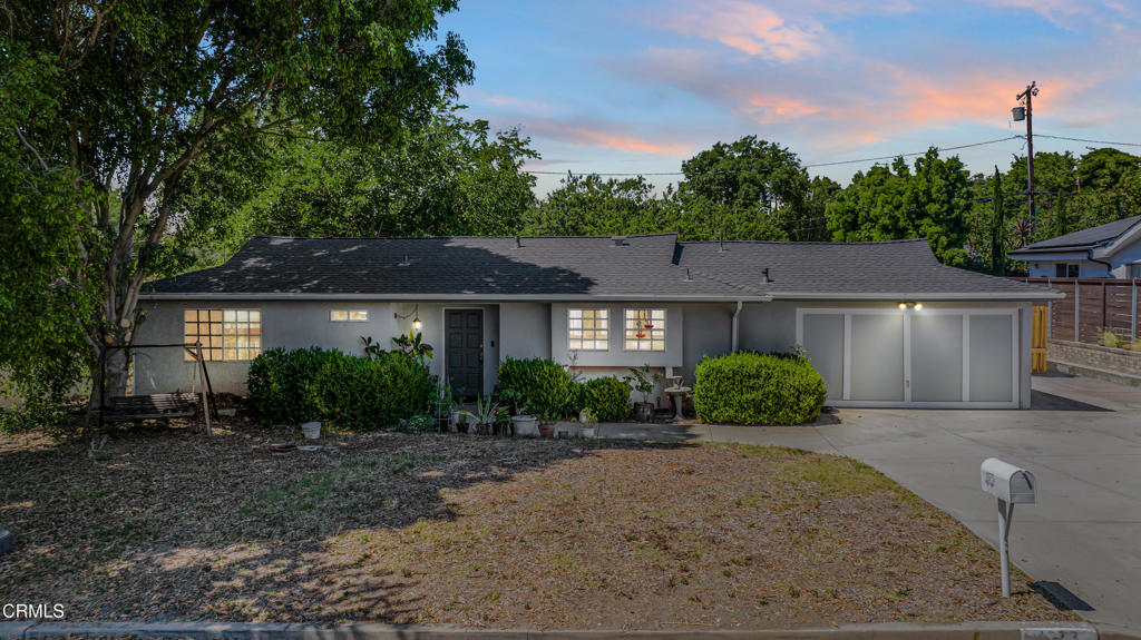 Situated on a generous 9,583 sq ft lot in the heart of Thousand Oaks, this lovely home offers a warm and inviting atmosphere, perfect for families or first-time buyers. The beautifully maintained front yard, highlighted by a stunning mature tree, sets the tone for the charm you'll find inside. With 979 sq ft of well-used living space, this single-story property features 3 comfortable bedrooms and 1 full bathroom. As you enter, a practical coat closet provides convenience, leading into a light-filled kitchen with two large windows offering serene street views. The kitchen is both functional and charming, with white cabinetry that provides plenty of storage, tile countertops, and a double sink. It flows easily into the spacious living room, which boasts a ceiling fan and access to the backyard creating a seamless indoor-outdoor experience. In the bedroom wing, you'll find three well-proportioned rooms, two with built-in closets, all sharing a full bathroom with a tub. The backyard is an oasis of space and greenery, featuring a covered patio area ideal for family gatherings, a large grassy area perfect for play or relaxation, beautiful mature trees, and a handy storage shed. Completing the home is a two-car garage, new roof, and a peaceful neighborhood setting close to parks, schools, and local amenities. This is a wonderful opportunity to own a charming home with both indoor comfort and expansive outdoor living.
