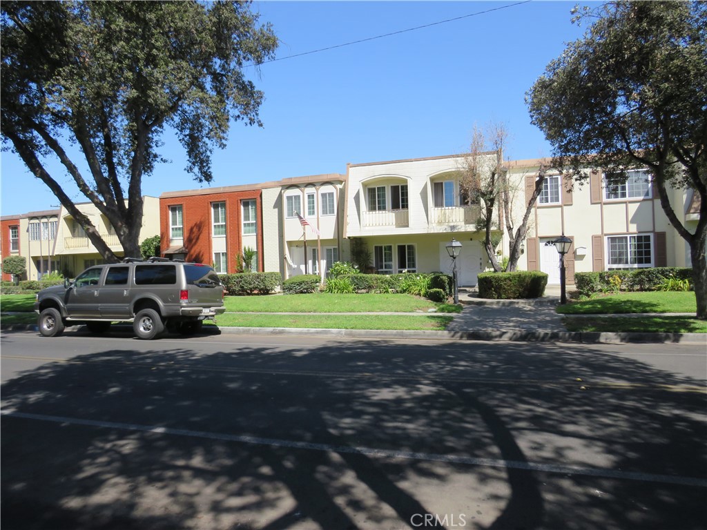 Up for sale is this beautifully remodeled 2 bedroom and 1.5 baths townhome in the Gramercy Park community of Anaheim. Features include all new interior paint with scrapped ceilings t/o, all new decorator vinyl floors throughout, all new baseboards and door trim t/o, all new electrical plugs and switches t/o, remodeled kitchen and baths, new ceiling fans t/o, new window treatment and screens, remodeled utility room with newer washer and dryer, huge patio area with herb garden and citrus trees and a spacious two car detached garage with opener at the rear of the property. Also included is a new $11k hvac system and a brand new refrigerator. This townhome is convenient to the 5&91 fwy's and Disneyland. Serviced by Anaheim school district. Be sure and show this property to your fussy buyers. You won't be disappointed!