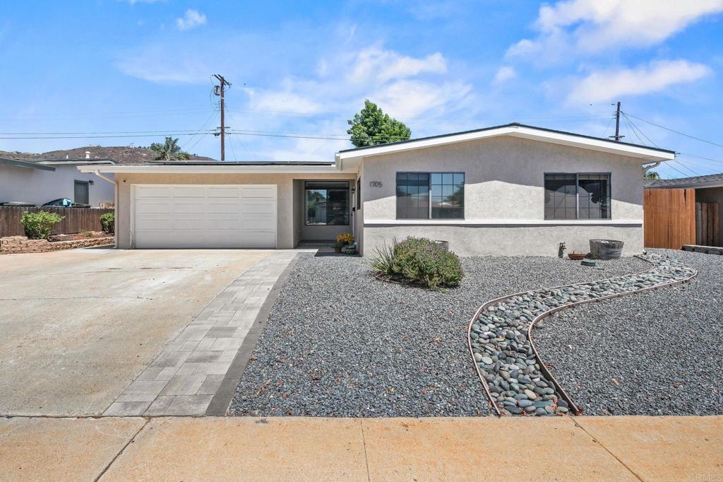 Nestled on a quiet street on the West side of El Cajon, this beautifully updated 3-bedroom, 2-bathroom single-story home is the perfect blend of modern comfort and timeless charm. Located within the desirable Santee School District, this move-in ready gem offers everything a growing family or first-time buyer could ask for — inside and out. A bright and open living/dining area flows effortlessly into a fully remodeled chef’s kitchen, complete with quartz countertops, white shaker cabinets, custom tile backsplash, and stainless steel appliances. York Central A/C and ceiling fans in every bedroom keep the home cool and comfortable all year round, and yes the home has solar! Step outside to a private backyard oasis designed for easy living and entertaining. You’ll love the Low-maintenance synthetic turf and stamped concrete patio, perfect for outdoor dining or a relaxing evening by the built-in fire ring. Oversized 2-car garage plus room for RV parking and additional vehicles in the extended driveway. Convenient access to Highways 8, 52, and 67, making commuting a breeze. Zoned for top-rated Pepper Drive Elementary and Santana High School, all within the Santee School District. A quiet, walkable neighborhood close to parks, shopping, and dining in both El Cajon and Santee.