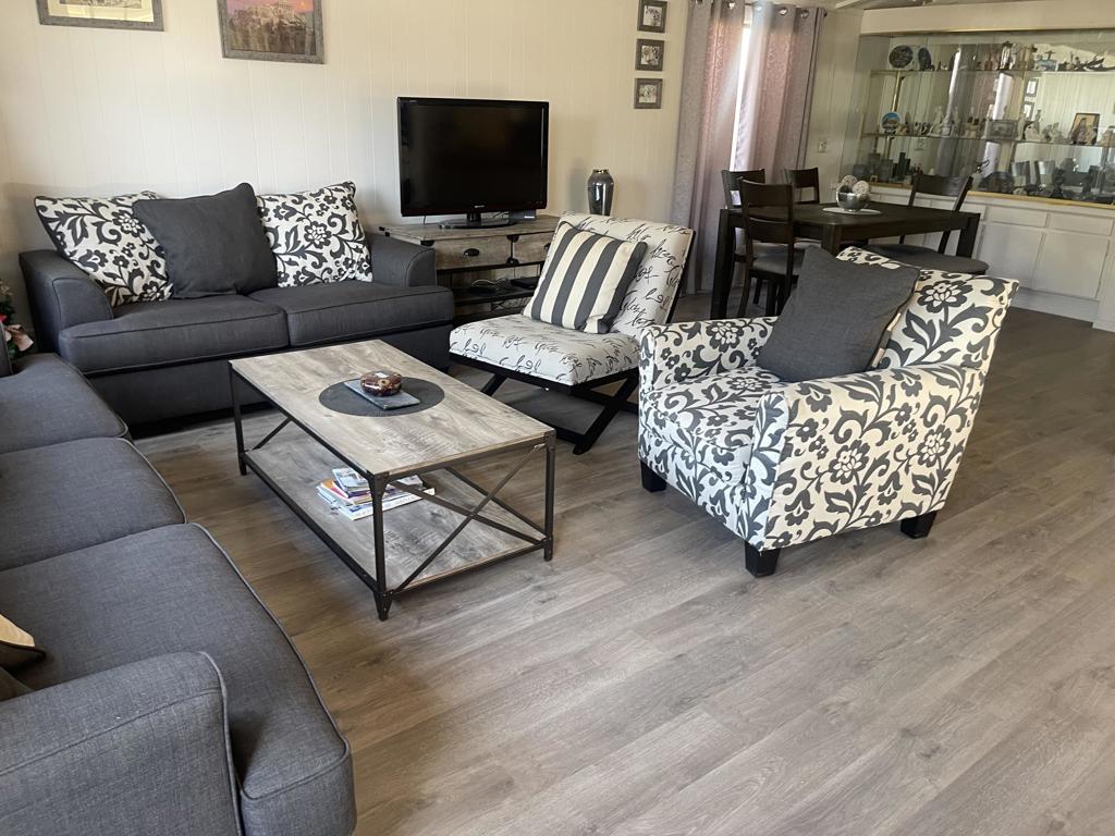 Under $300.000 for Seniors over 55 , Beautiful Home in a Gated Community with Pool , Spa , Club house 2 Car Garage and RV Parking for a Small fee.