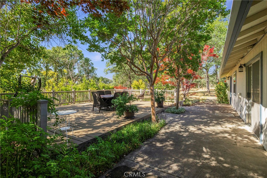 10-ACRES WITH AMAZING 3-BED, 2-BATH HOMESTEAD!! PRIVATE 10-acre spread of FULLY FENCED and CROSS-FENCED land with LUSH GRAZING PASTURES, EXCELLENT GARDEN AREA.... this beautifully upgraded home offers the perfect blend of comfort, function, and natural beauty. Enjoy tranquil mornings overlooking a SEASONAL POND a YEAR-ROUND AGRICULTURAL CANAL that bring life and charm to the landscape. Boasting 1,658 square feet, the home features an open floor plan with new flooring throughout, fresh Benjamin Moore interior paint, and a spacious living and dining area. Sliding glass doors lead to a large composite deck surrounded by colorful, ever-changing gardens — from roses and Japanese maples to wisteria and citrus trees — and an outdoor shower tucked within a peaceful backyard sanctuary. The kitchen includes a brand-new range/stove, while all bedrooms are outfitted with new carpet, doors, hardware, ceiling fans, and recessed lighting. A newly built bay window seat in the master suite adds a perfect nook for reading or relaxing, and the bathrooms now feature new toilets, a walk-in shower, and updated finishes. The attic has been freshly insulated for comfort and efficiency, and nearly all windows have been replaced with new fire-resistant models and elegant trim. A two-car garage, indoor laundry, walk-in closets, and ample space for animals enhance the property’s appeal. Located just across from the iconic Lodestar Farms mansion, follow Walter Blume Road to the very end to discover this peaceful retreat with peekaboo views of the valley, stunning sunsets, sparkling stars, and just a hint of city lights at night. With privacy, practicality, and proximity — only 5 minutes to town or the highway — this countryside gem is truly one-of-a-kind. Schedule your private showing today before it’s gone!