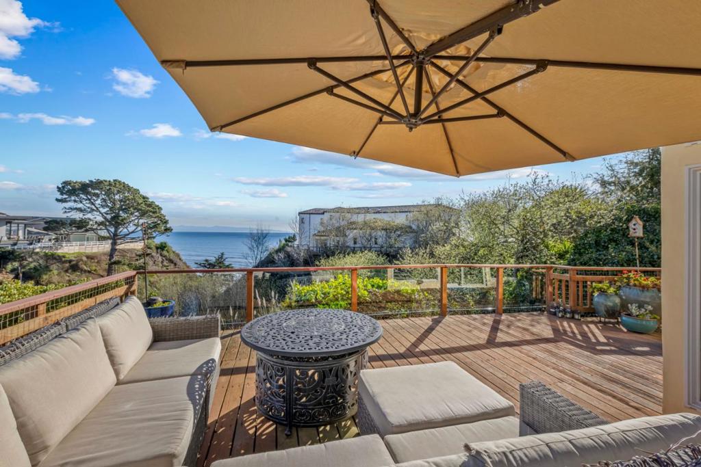 A Rare Ocean View Gem with Breathtaking Views! Tucked away in a coveted coastal enclave, this stunning ocean view retreat offers the perfect blend of luxury, comfort, and unparalleled views. Floor-to-ceiling windows frame the endless expanse of the Pacific, filling the home with natural light and the soothing sounds of the waves. Designed for both relaxation and entertaining, the open-concept living spaces seamlessly flow onto expansive decks, creating an effortless indoor-outdoor experience. The gourmet kitchen is a chefs dream, featuring high-end appliances and ocean views that make every meal unforgettable. With four spacious bedrooms plus a bonus office and four beautifully appointed bathrooms, theres plenty of room to unwind. The serene primary suite boasts panoramic ocean vistas and a private balconythe perfect spot to savor morning coffee Whether you're hosting sunset gatherings, enjoying a quiet morning stroll on the beach, or simply taking in the beauty of the coastline from the comfort of home, this rare ocean view property offers an extraordinary lifestyle. Dont miss this opportunity to own a front-row seat to the Pacific!